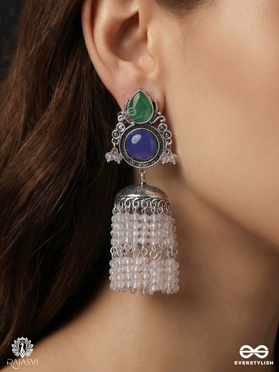 Indraneelika – Oxidised Tassel Earrings With Green Teardrop Stones, Indigo Accents And Pearl Cascades