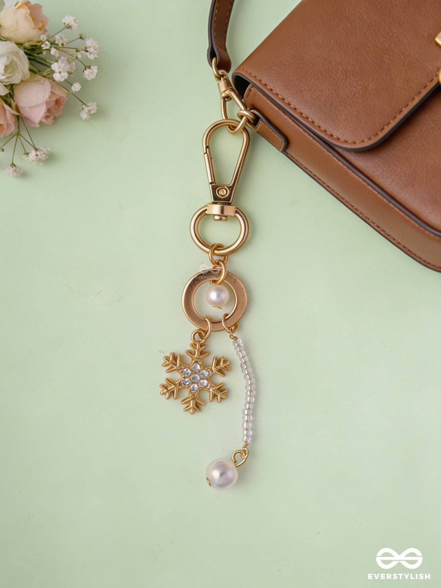 Star Dust – Pearl Bag Charm With Golden Star Details