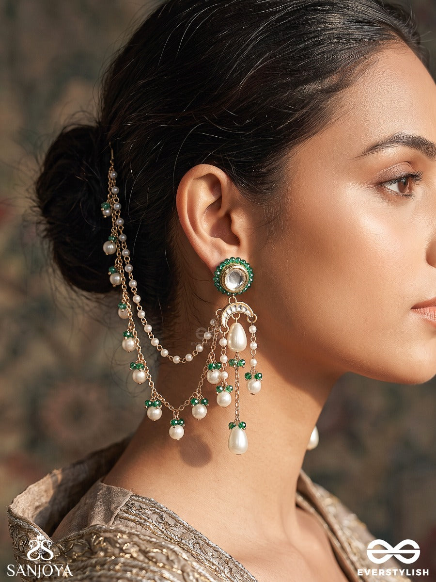 Quinara – Precious Grace – Elegant Ear Chain Earrings With Emerald Bead Accents, Lustrous Pearl Drops, Layered Golden Chains And Ornate Circular Stud Detailing