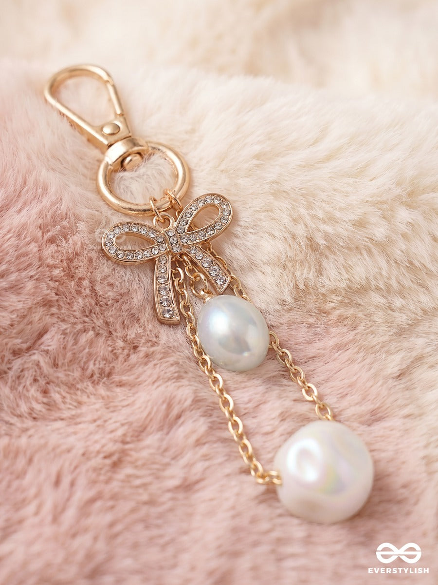 Frosted Bow – Elegant Bag Charm With Crystal And Pearl Drop