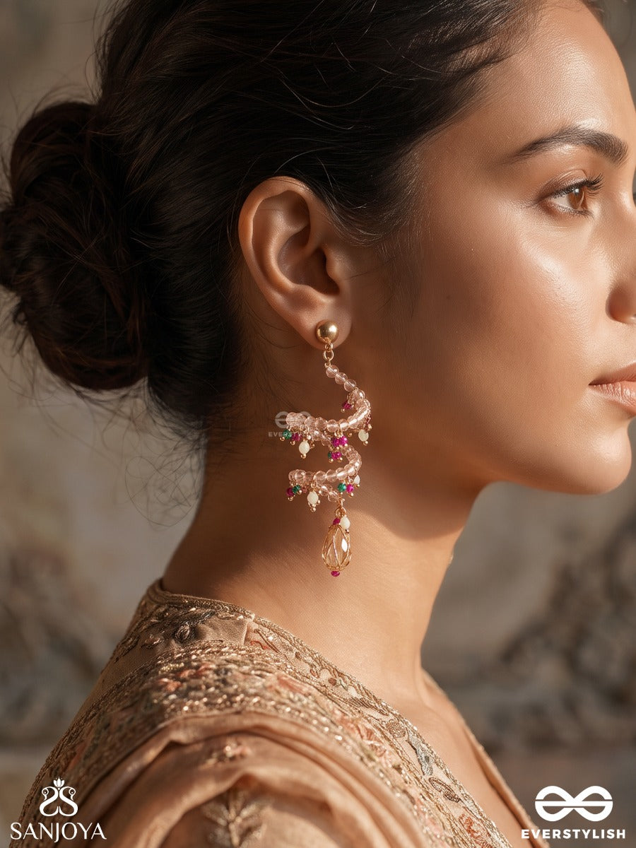 Kshanika – Moment Of Beauty – Sculptural Earrings With Spiral Pearl Strands, Magenta Crystal Clusters And Faceted Teardrop Pendants