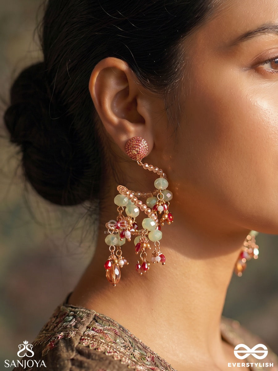 Vrishika – Scorpion Constellation – Sculptural Earrings With Spiral Pearl Strands, Green Gem Accents And Peach Crystal Drops