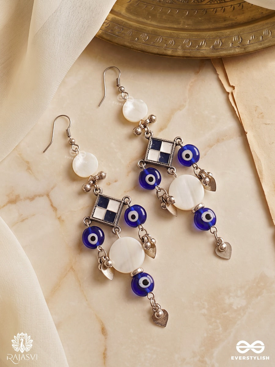Tarakshi – Oxidised Earrings With Blue Evil Eye Beads And Shell Accents