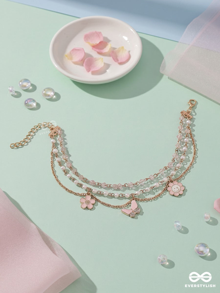 Pink Whimsy – Golden Layered Pearl Anklet (Single) With Pearl Strands, Floral And Bow Charms