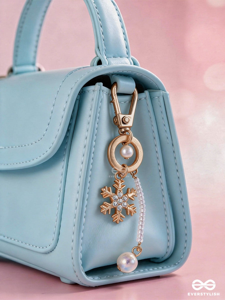 Star Dust – Pearl Bag Charm With Golden Star Details