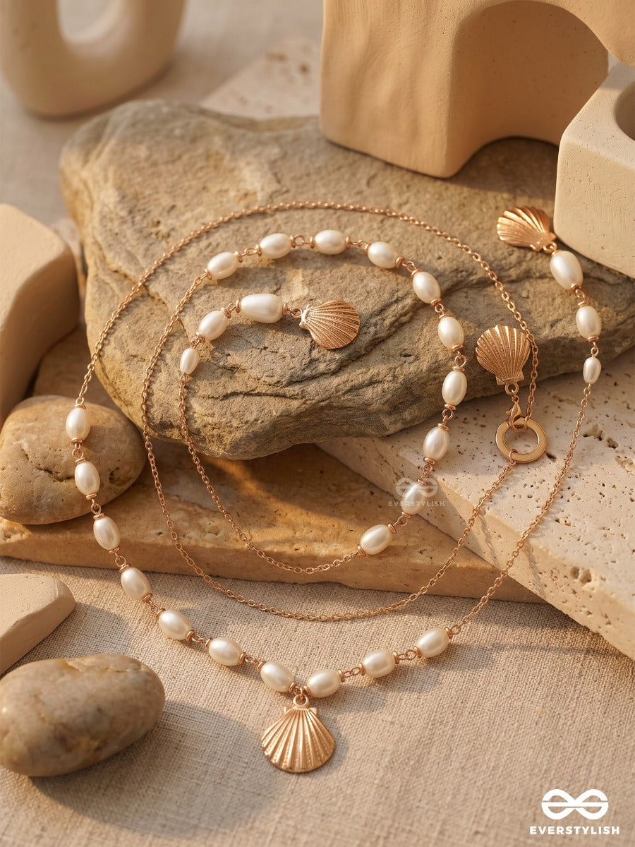 Shellscape – Multiway Chain With Golden Shell Charms And Freshwater Pearls That Can Be Styled As Necklace; Scarf-Style Necklace; Waist Chain; Knot Necklace