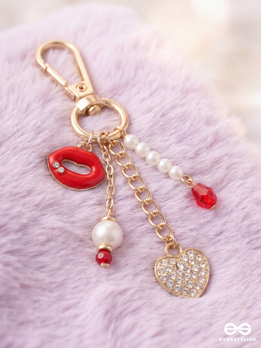 Kiss & Tell – Lip Bag Charm With Crystal Heart Details