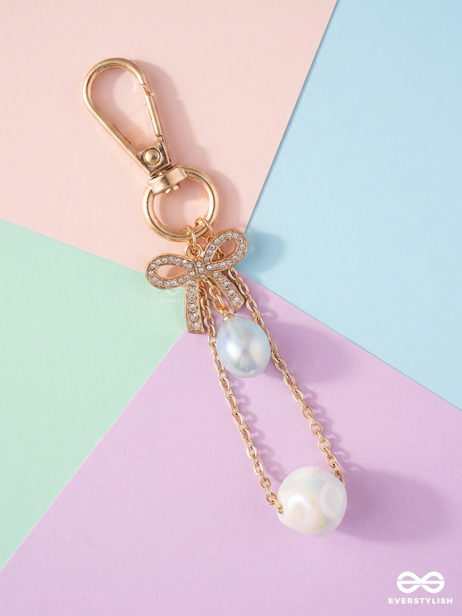 Frosted Bow – Elegant Bag Charm With Crystal And Pearl Drop