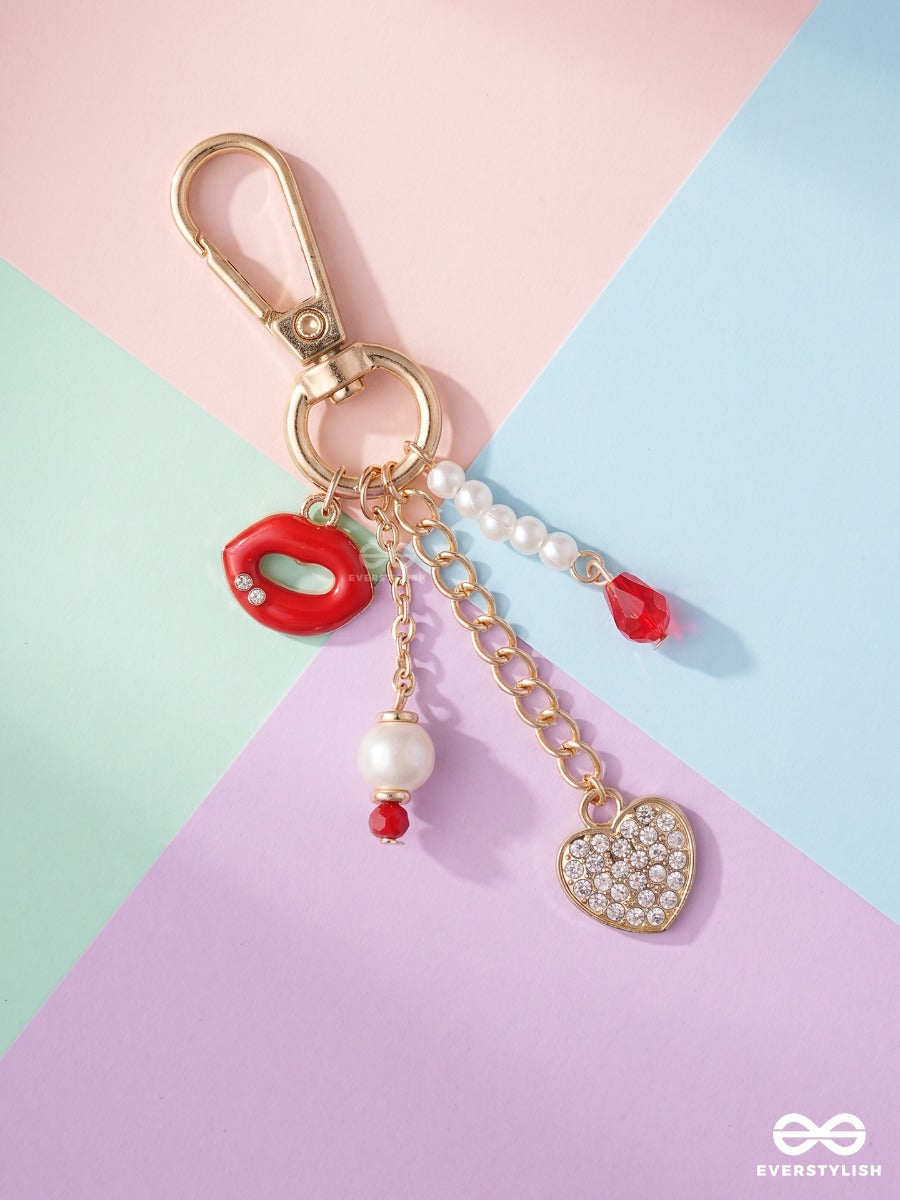 Kiss & Tell – Lip Bag Charm With Crystal Heart Details