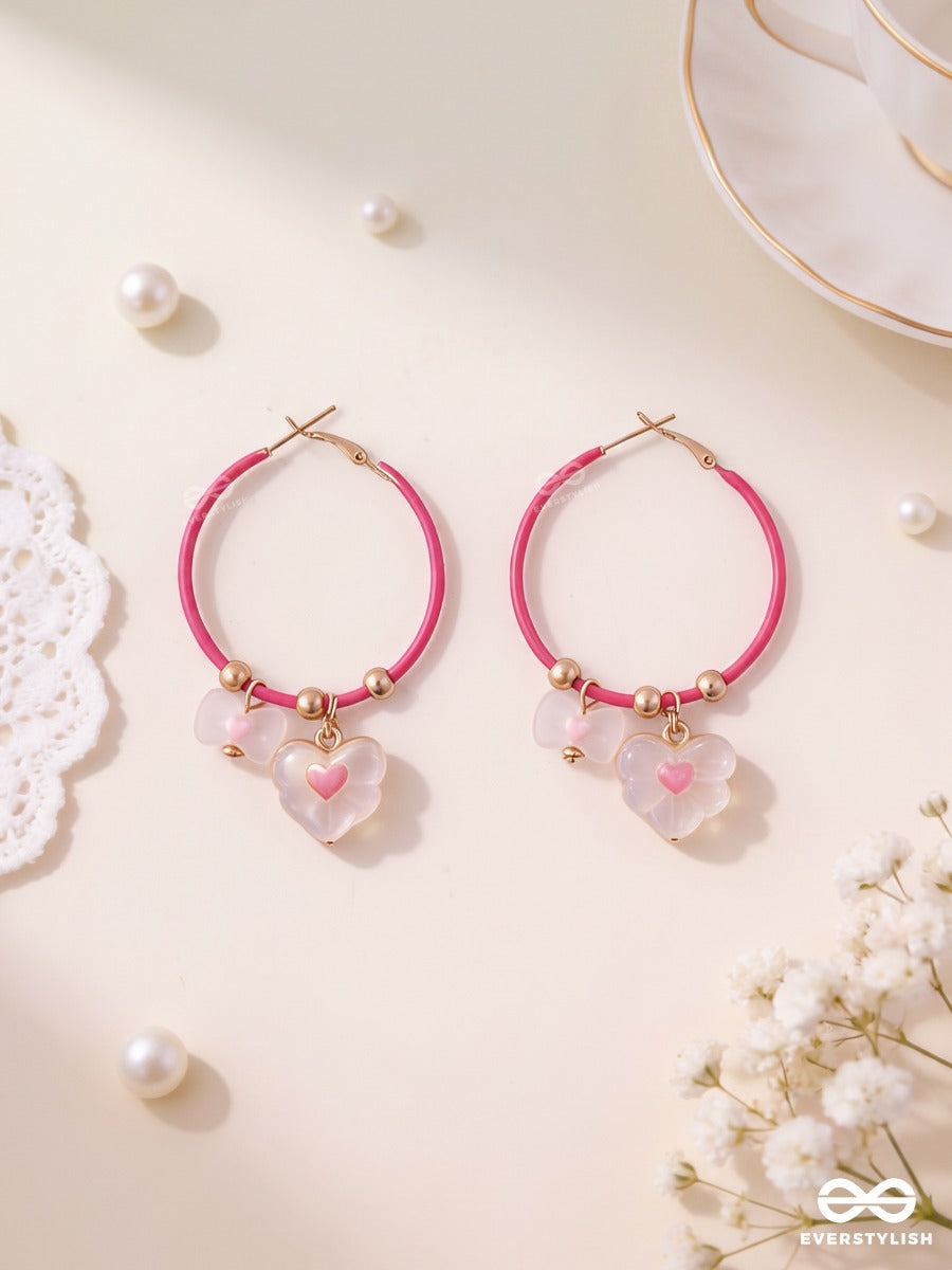 Heart Hush – Pink Hoop Earrings With Embossed Heart Charms