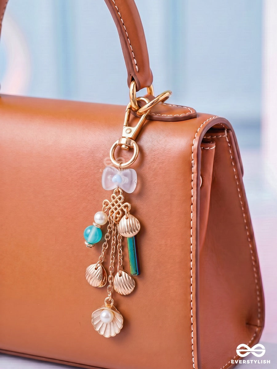 Beach Bauble – Coastal Bag Charm With Shell Details And Pearl Accents