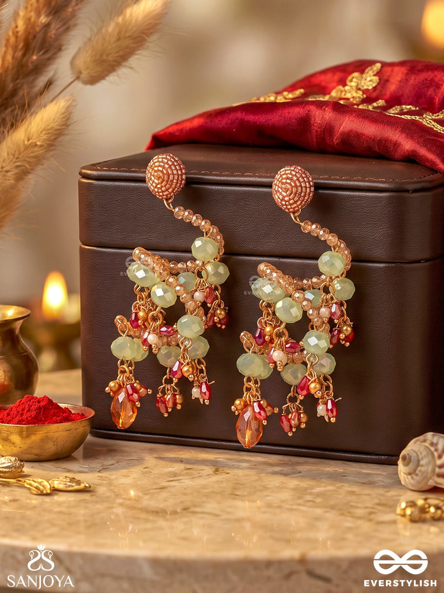 Vrishika – Scorpion Constellation – Sculptural Earrings With Spiral Pearl Strands, Green Gem Accents And Peach Crystal Drops