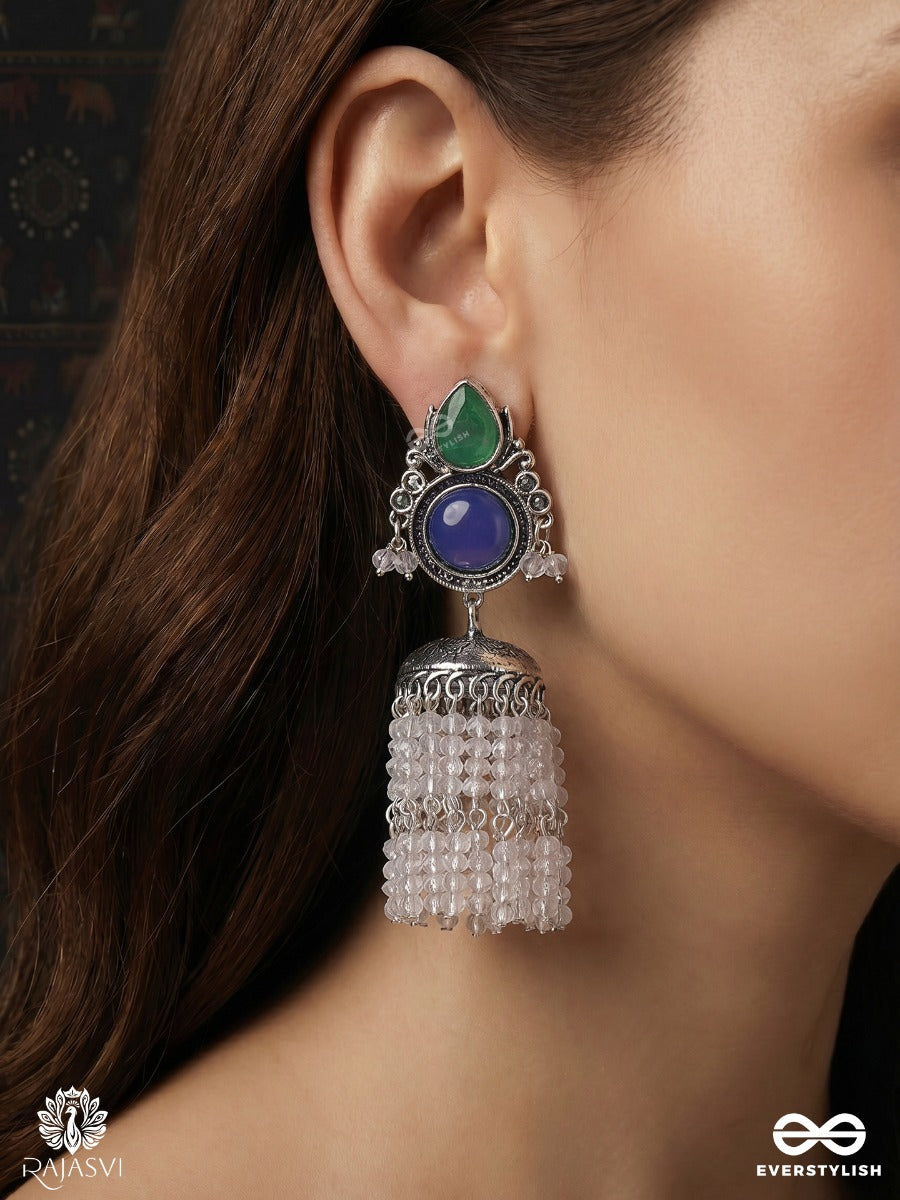 Indraneelika – Oxidised Tassel Earrings With Green Teardrop Stones, Indigo Accents And Pearl Cascades