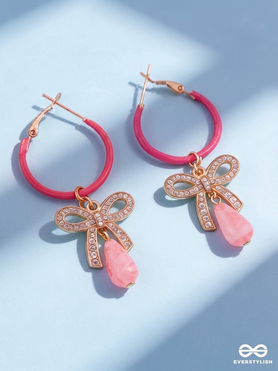 Pink Papillon – Pink Hoop Earrings With Crystal Bow And Drop Charms