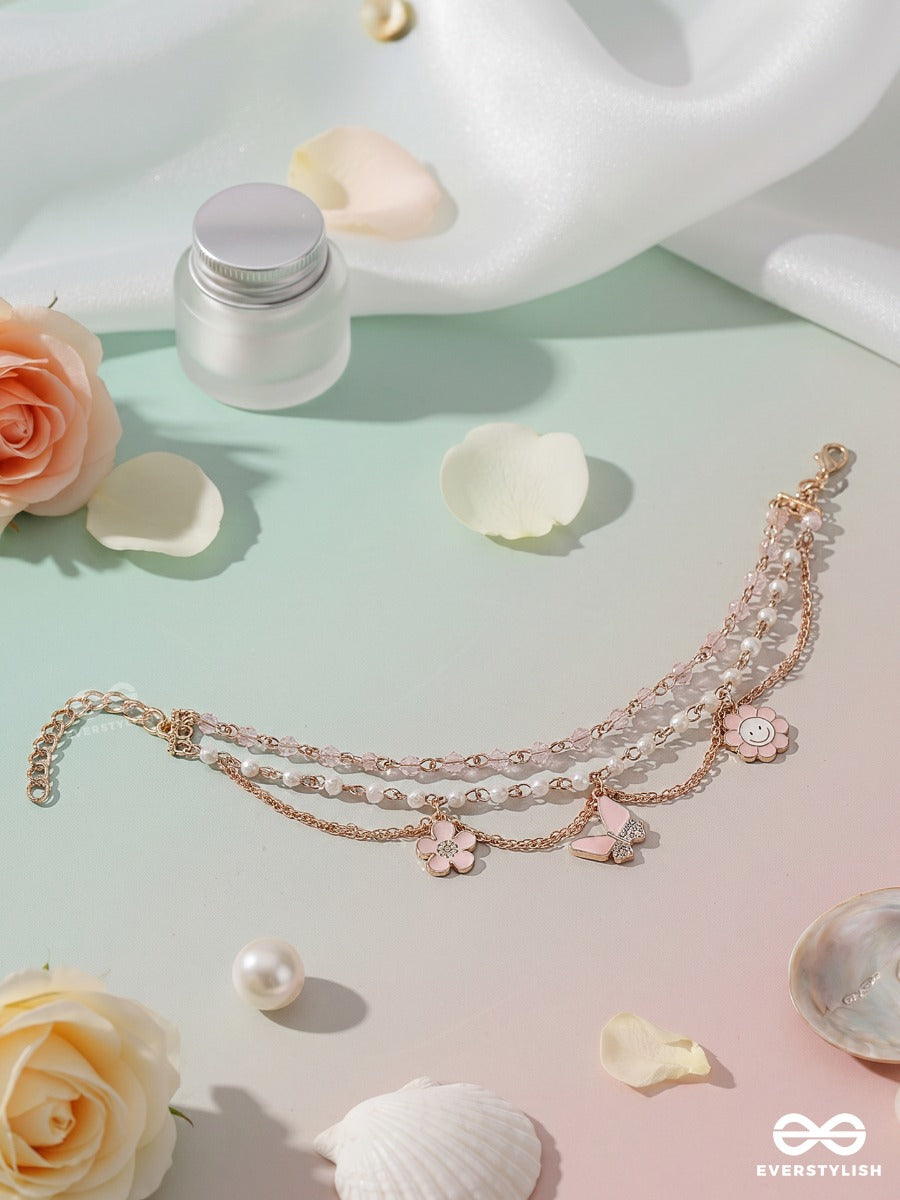 Pink Whimsy – Golden Layered Pearl Anklet (Single) With Pearl Strands, Floral And Bow Charms