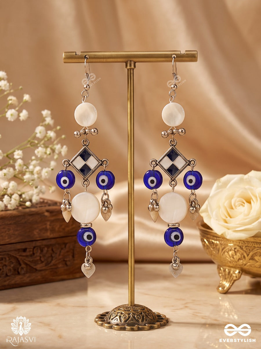 Tarakshi – Oxidised Earrings With Blue Evil Eye Beads And Shell Accents