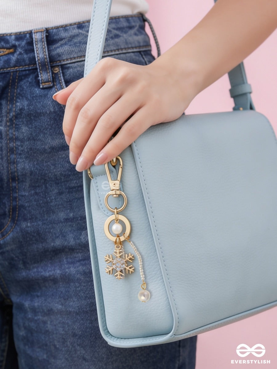 Star Dust – Pearl Bag Charm With Golden Star Details