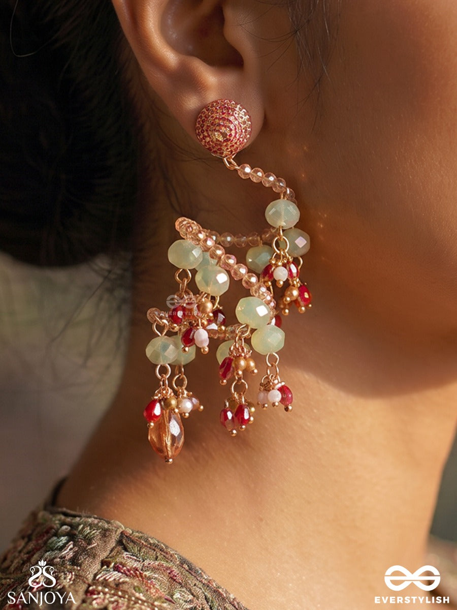 Vrishika – Scorpion Constellation – Sculptural Earrings With Spiral Pearl Strands, Green Gem Accents And Peach Crystal Drops