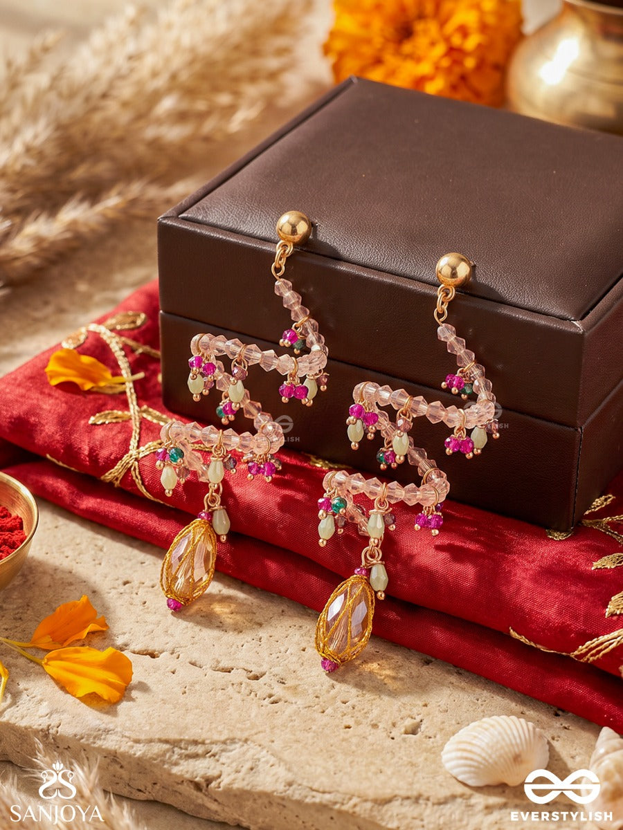 Kshanika – Moment Of Beauty – Sculptural Earrings With Spiral Pearl Strands, Magenta Crystal Clusters And Faceted Teardrop Pendants