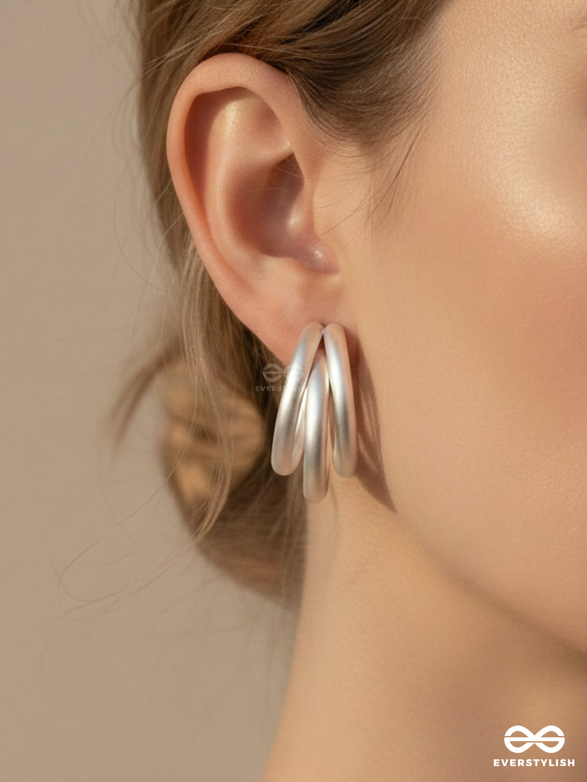 The Elegant Turns - Matte Finished Silver Hoops