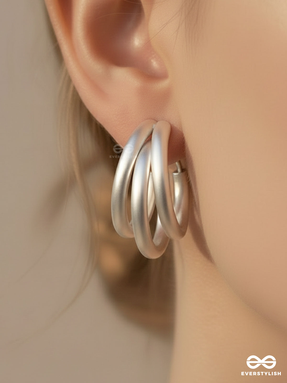 The Elegant Turns - Matte Finished Silver Hoops