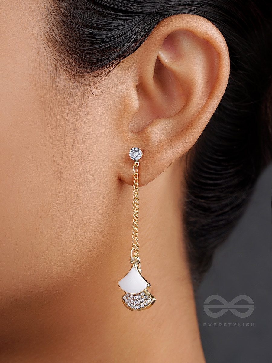 The Pendulum Effect- White And Golden Earrings