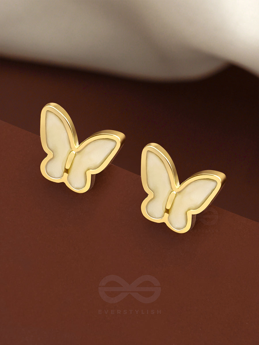 The Winged Wonder- White And Golden Earrings