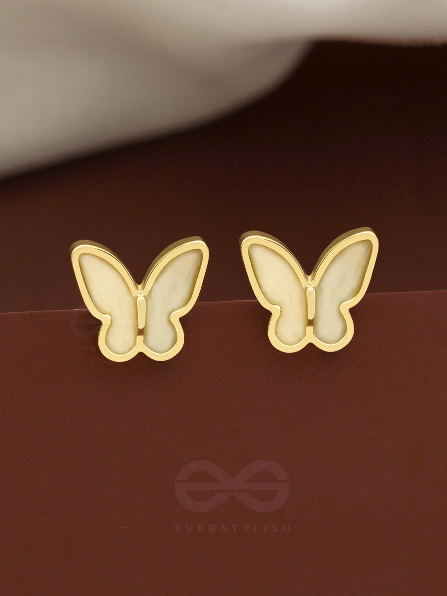 The Winged Wonder- White And Golden Earrings