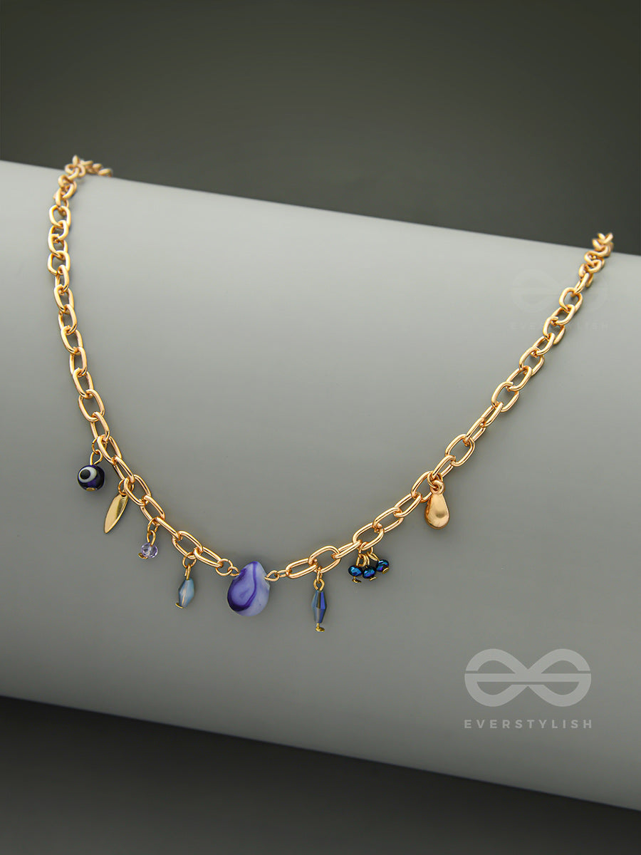 Fragments Of The Sky- Blue Crystals Studded Golden Necklace