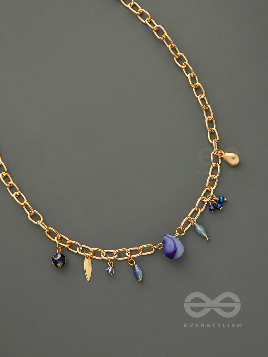 Fragments Of The Sky- Blue Crystals Studded Golden Necklace