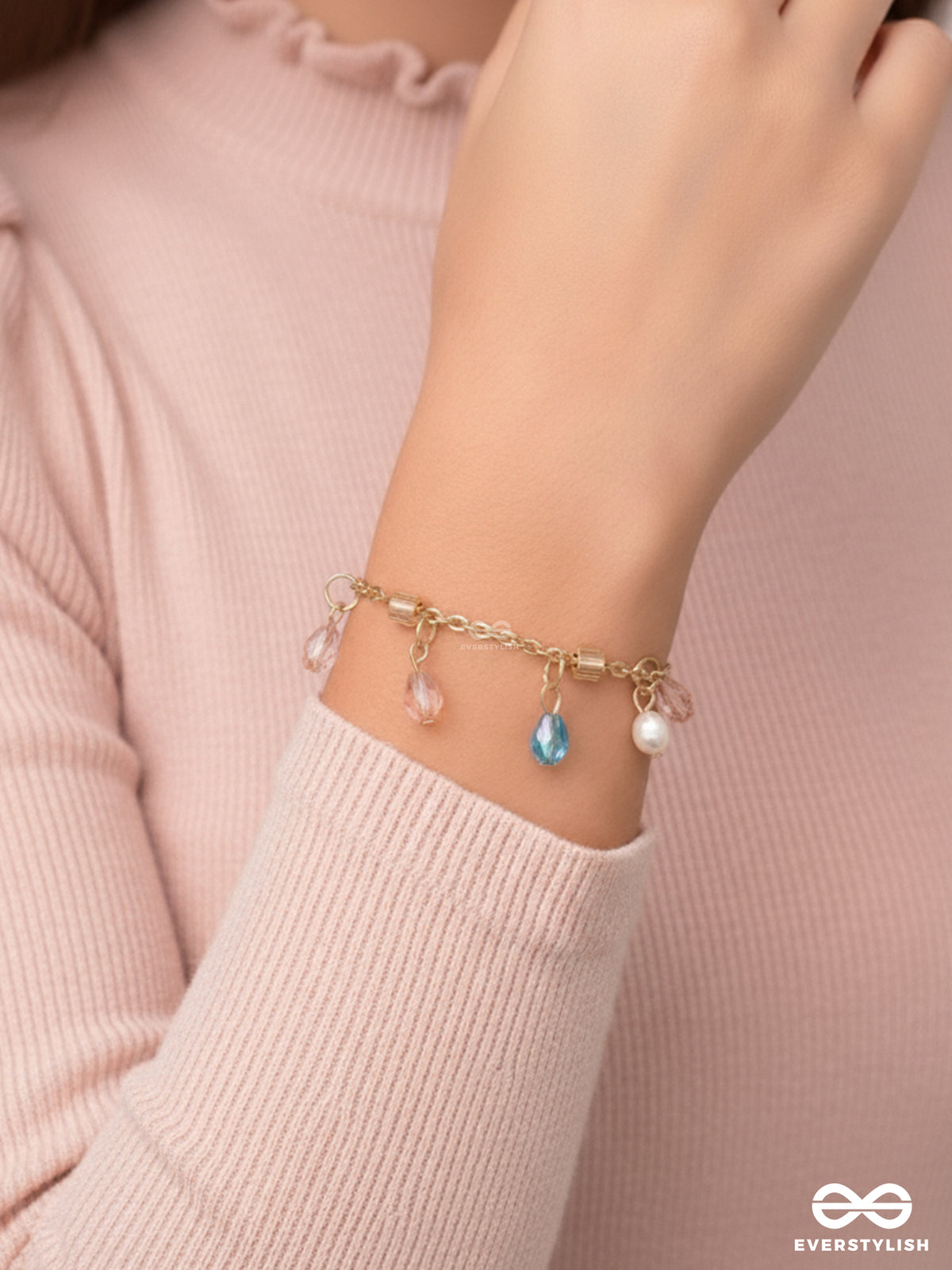 The Shimmering Sleet- Pearl And Crystals Studded Golden Bracelet
