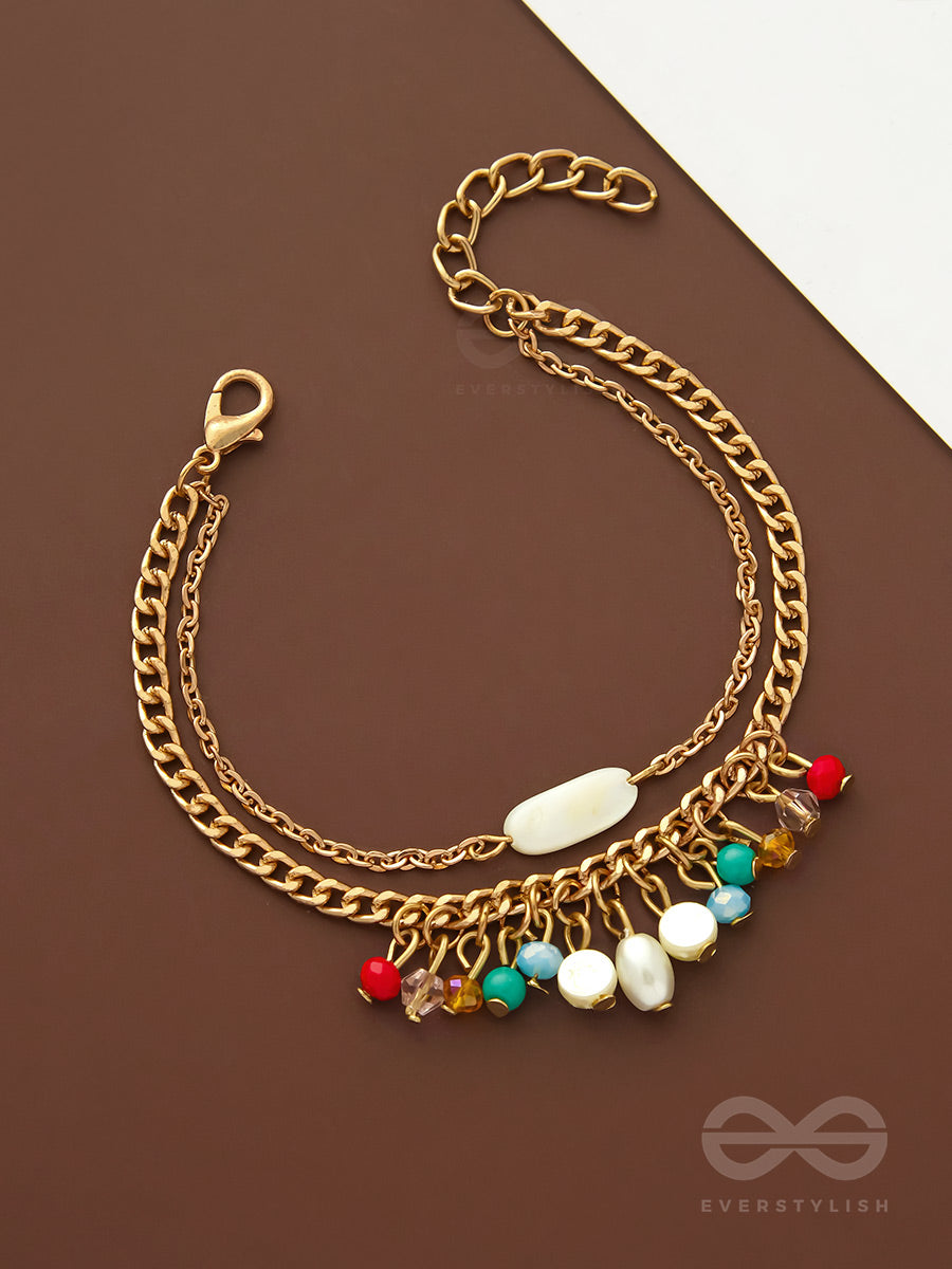 The Divine Galaxy- Pearls And Beads Studded Golden Bracelet