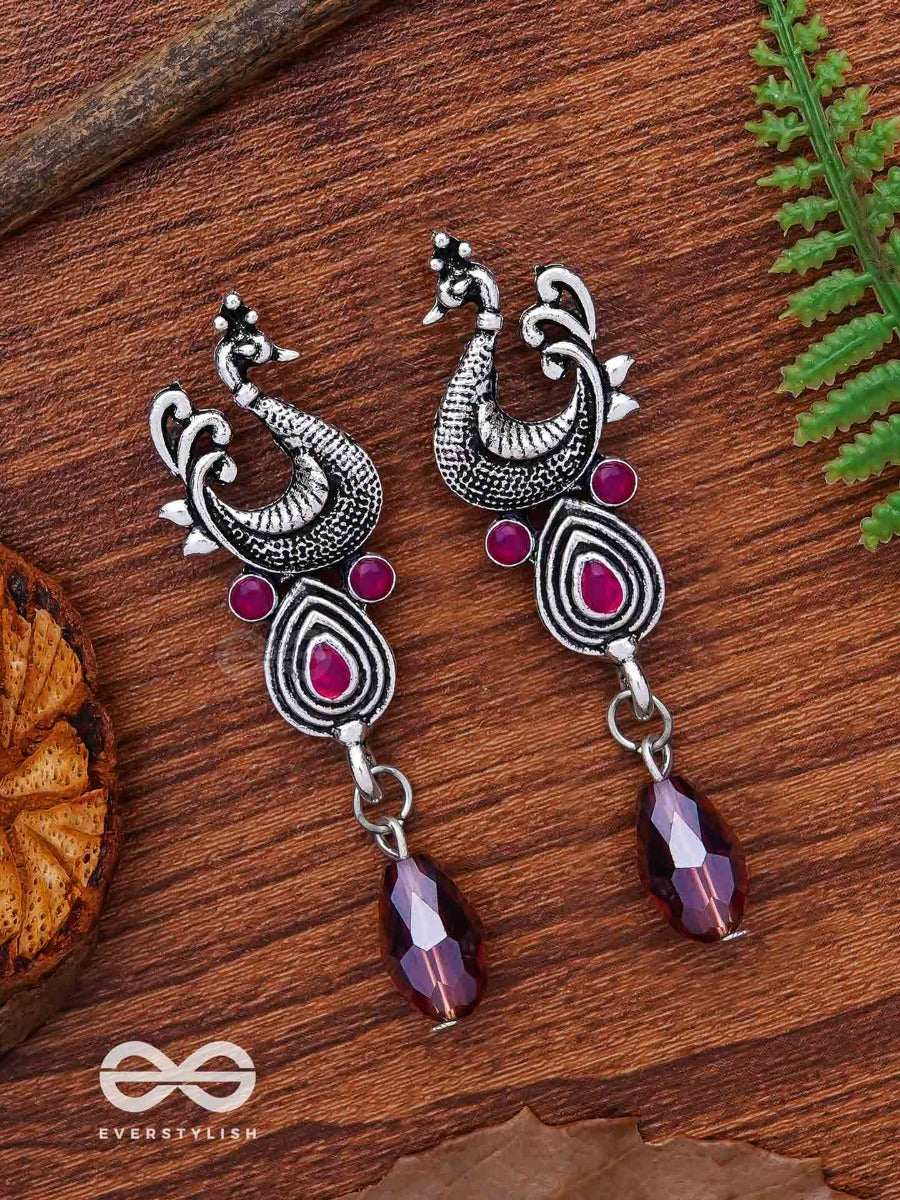 The Prancing Peacock- Embellished Oxidized Earrings (Magenta And Lavender)