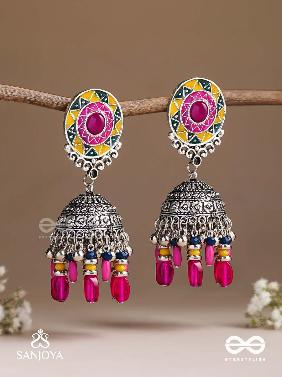 Suryaruchi-Sun's Radiance-Lavish Pink Earrings Enamelled With A Sun Motif And Oxidized Jhumka Adorned With Beads And Ghunghroos
