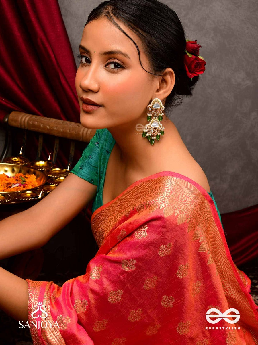 Kundalangi-Kundan Elegance- Traditional Pearl And Kundan Earrings Adorned With Beads, Stones, And Green Danglers For A Regal Touch.
