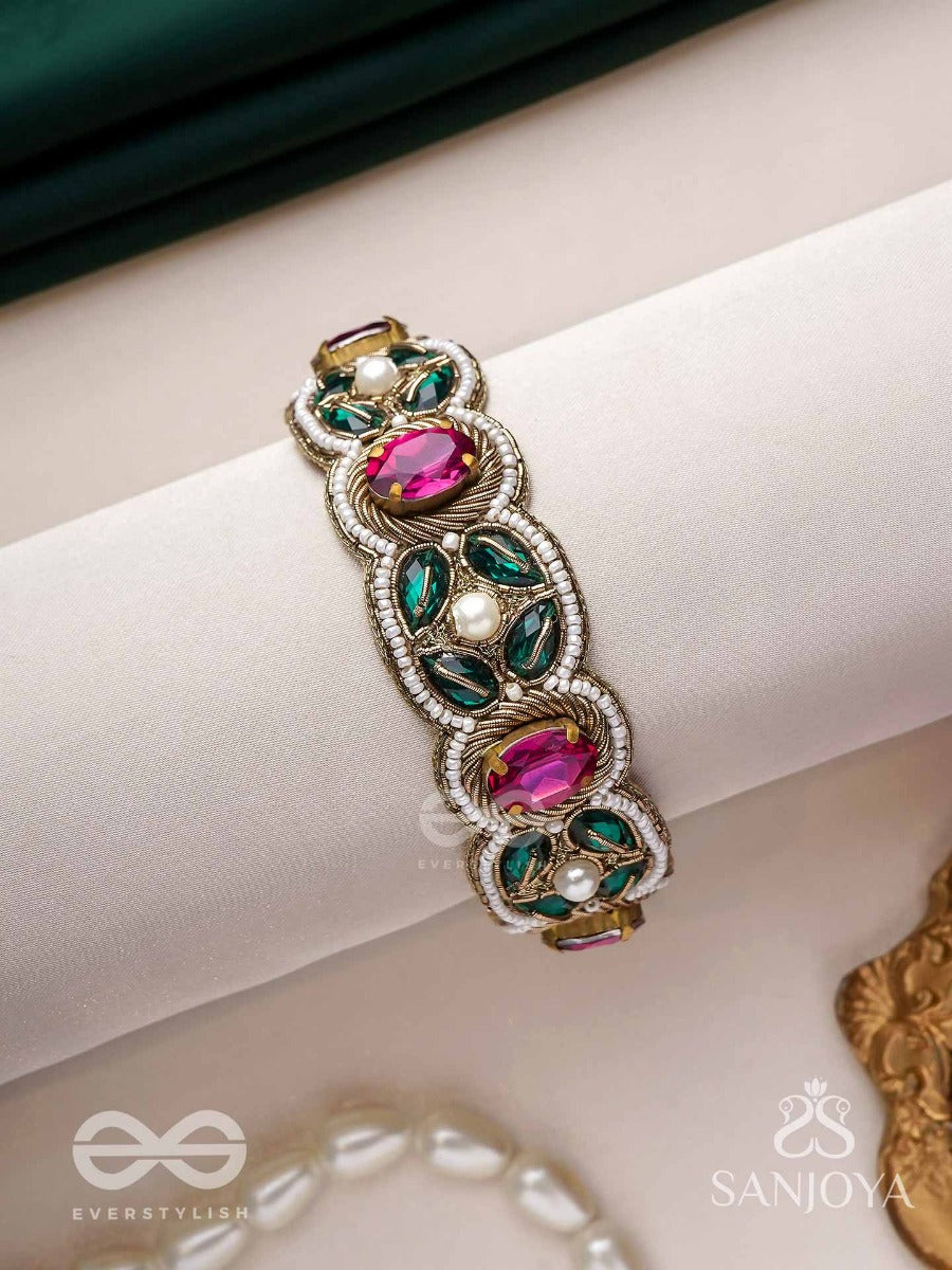 Tarangini-Wavy Beauty-Opulent Bracelet Embedded With Purple And Green Stones
