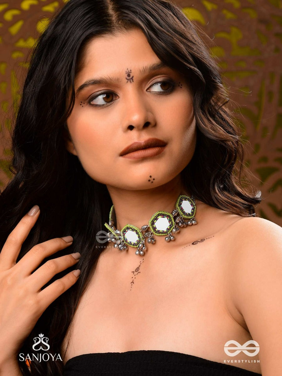 Chayamala-Reflective Choker- Oxidized Choker Featuring Intricate Beadwork, Mirrors, Ghungroo (Small Bells), And Thread Details