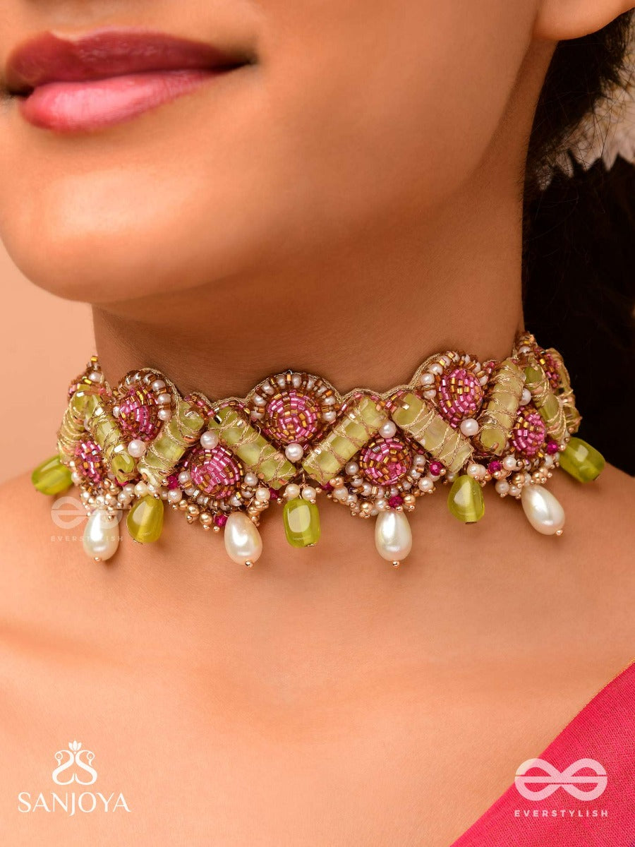 Manimekhala-Bejewelled Girdle-Choker Adorned With Pink And Gold Gemstones, Beads And Delicate Pearl Drops.
