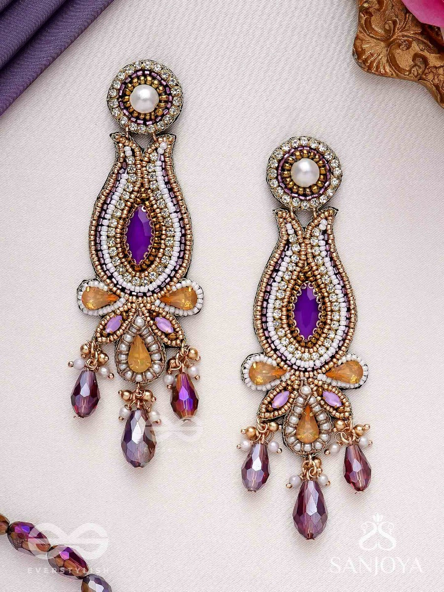 Divyashobhana-Divine Splendour-Lotus-Inspired Embroidered Design, Adorned With Purple And Golden Gem-Studded Motifs, Pearl And Beads.