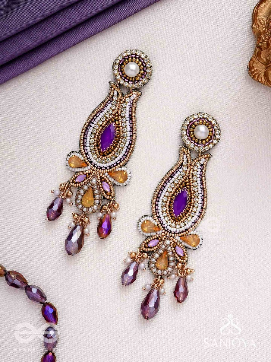 Divyashobhana-Divine Splendour-Lotus-Inspired Embroidered Design, Adorned With Purple And Golden Gem-Studded Motifs, Pearl And Beads.