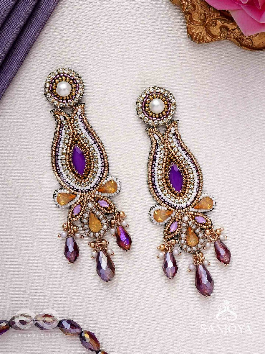 Divyashobhana-Divine Splendour-Lotus-Inspired Embroidered Design, Adorned With Purple And Golden Gem-Studded Motifs, Pearl And Beads.