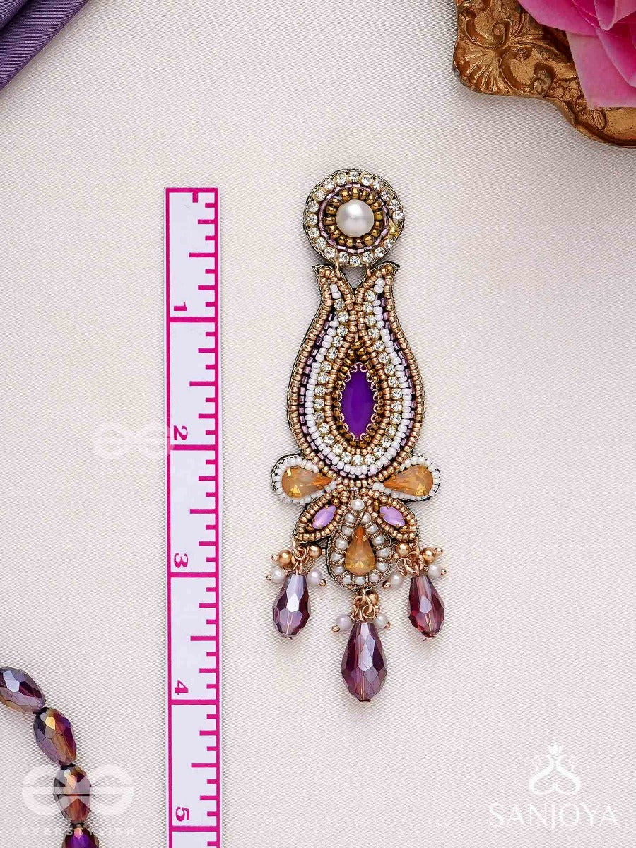 Divyashobhana-Divine Splendour-Lotus-Inspired Embroidered Design, Adorned With Purple And Golden Gem-Studded Motifs, Pearl And Beads.