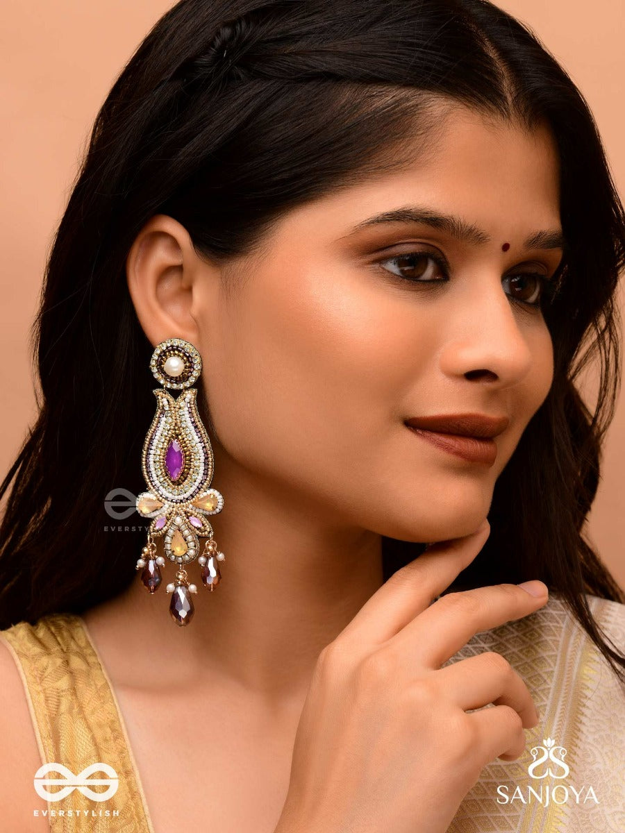 Divyashobhana-Divine Splendour-Lotus-Inspired Embroidered Design, Adorned With Purple And Golden Gem-Studded Motifs, Pearl And Beads.