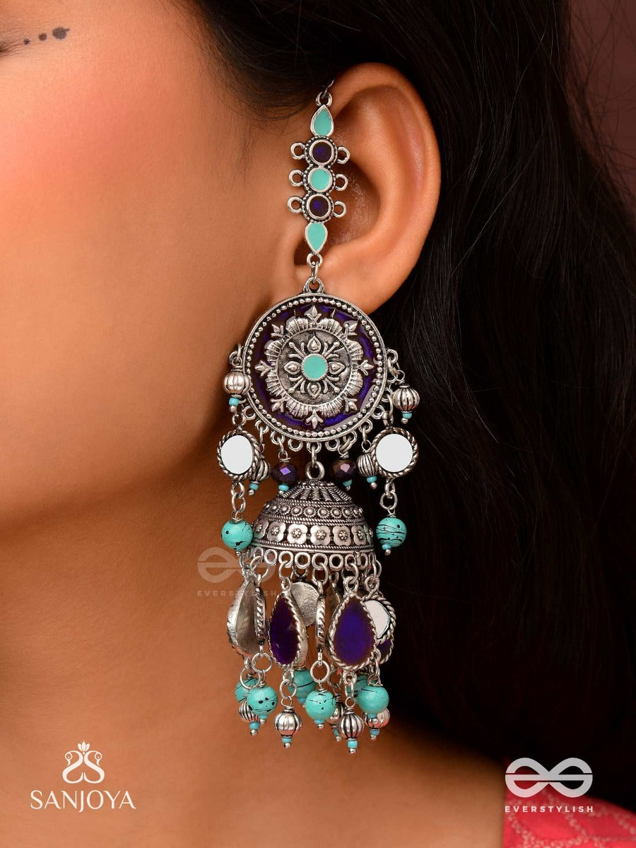 Ratna Tilaka-Jewel Adornment- Earrings Enamelled In Shades Of Blue And Black, Accented With Ghungroo Beads And Oxidized Jhumki