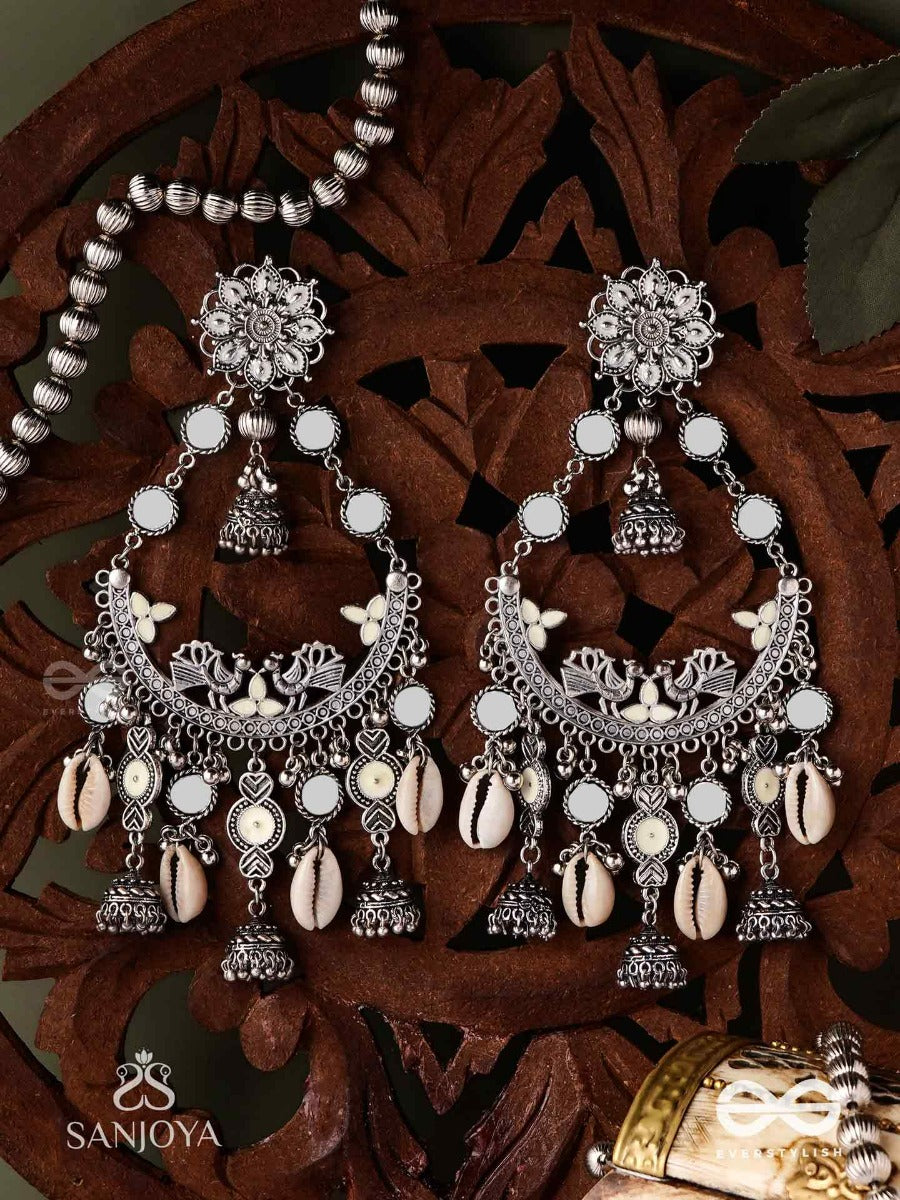 Chandramayura- Moon-Peacock Earrings- Oxidized Chaandbaali Earrings, Adorned With Mirrors, Ghunghroos, Cowrie Shells, And Dangling Jhumka
