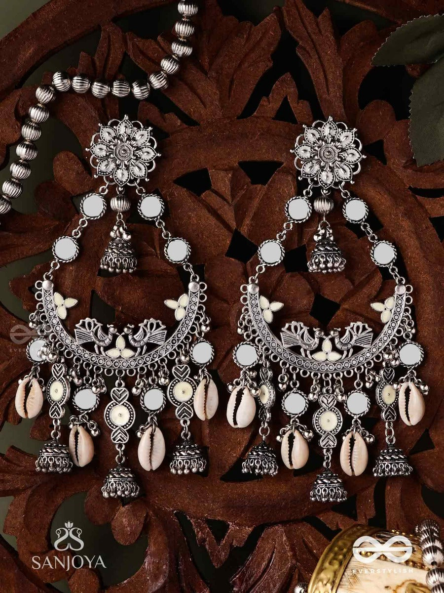 Chandramayura- Moon-Peacock Earrings- Oxidized Chaandbaali Earrings, Adorned With Mirrors, Ghunghroos, Cowrie Shells, And Dangling Jhumka