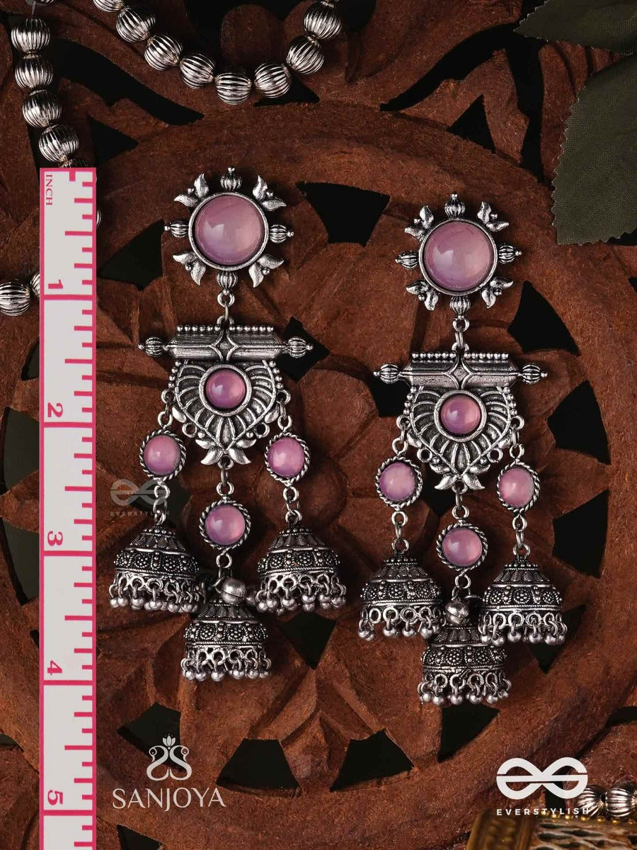 Vijayamukta-Victory Pearls- Regal Oxidized Earrings With A Central Purple Stone And Layered Jhumkas