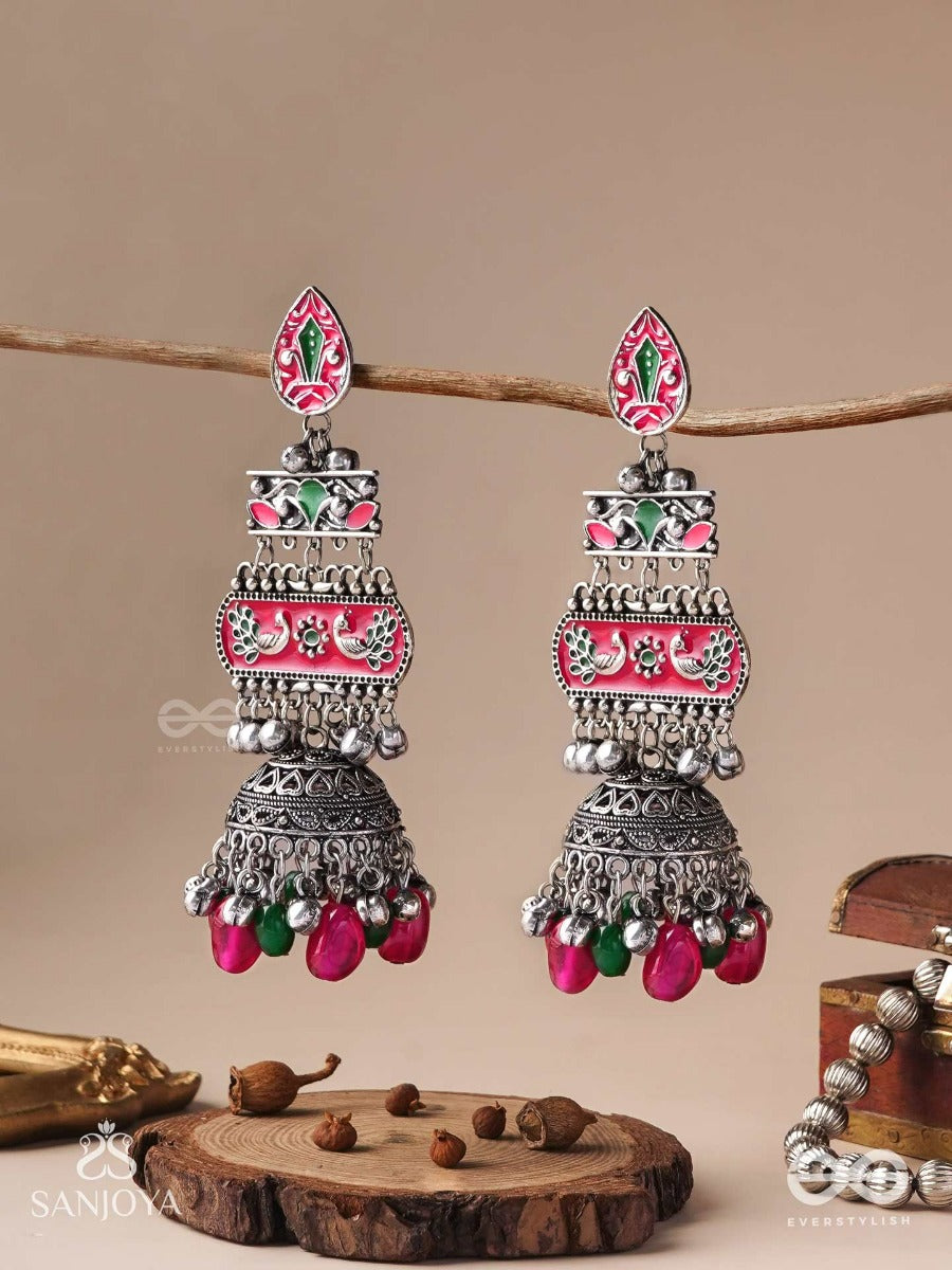 Vajrashringara-Diamond Adornment-Enamelled Oxidised Motifs Set On Silver Metalwork, Embellished With Glossy Beads And Jhumkas