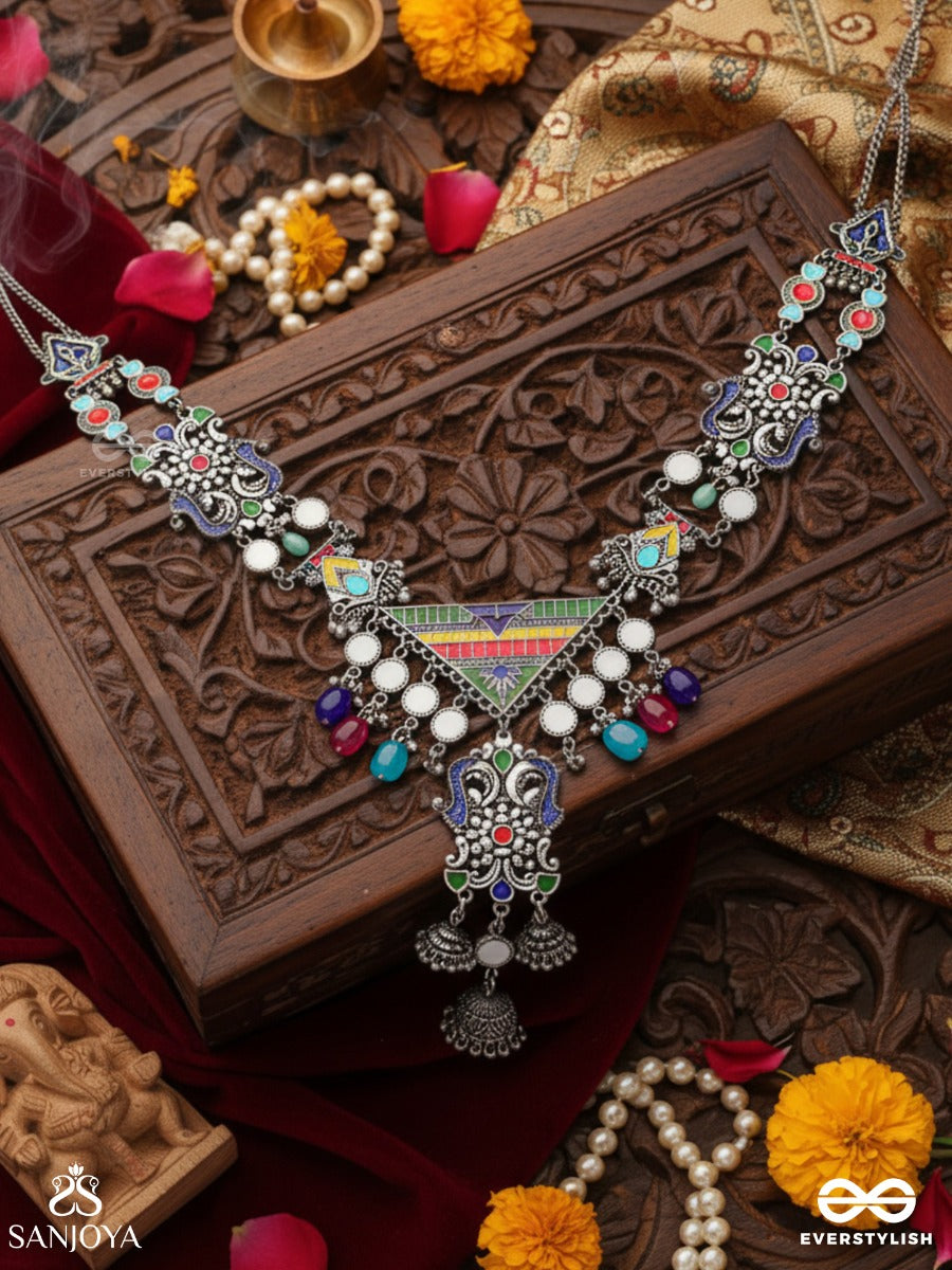 Prema Raga- Love Colour- Enamelled Oxidized Neckpiece Embellished With Beads, Mirror And Dangling Jhumka.