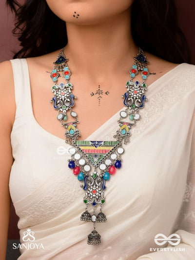 Prema Raga- Love Colour- Enamelled Oxidized Neckpiece Embellished With Beads, Mirror And Dangling Jhumka.